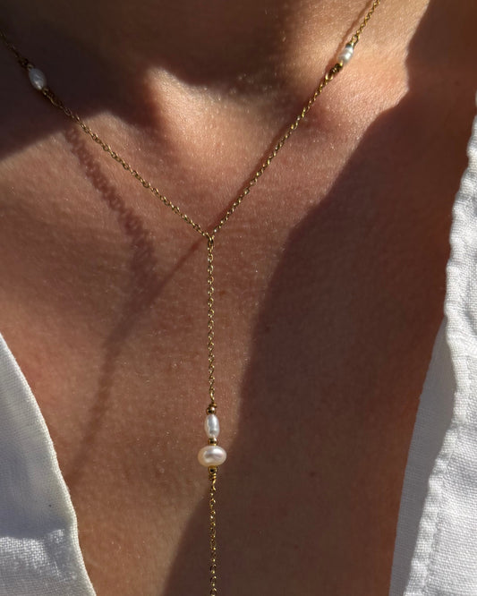 lange y ketting met parels goud