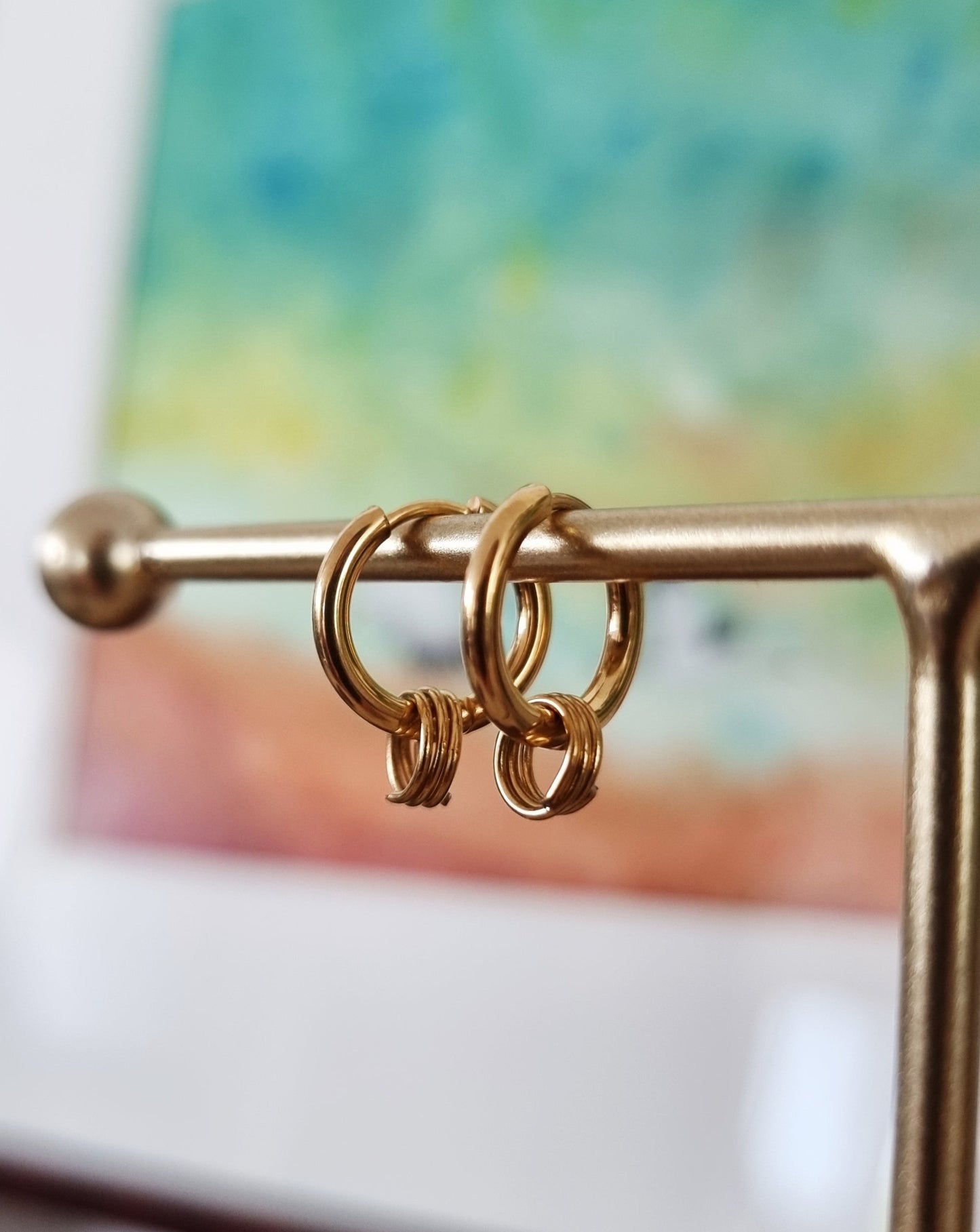 Rique | Gouden rvs oorbellen met ringetjes | Stainless steel