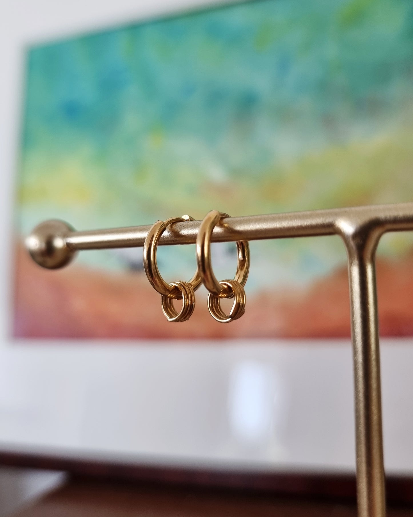 Rique | Gouden rvs oorbellen met ringetjes | Stainless steel