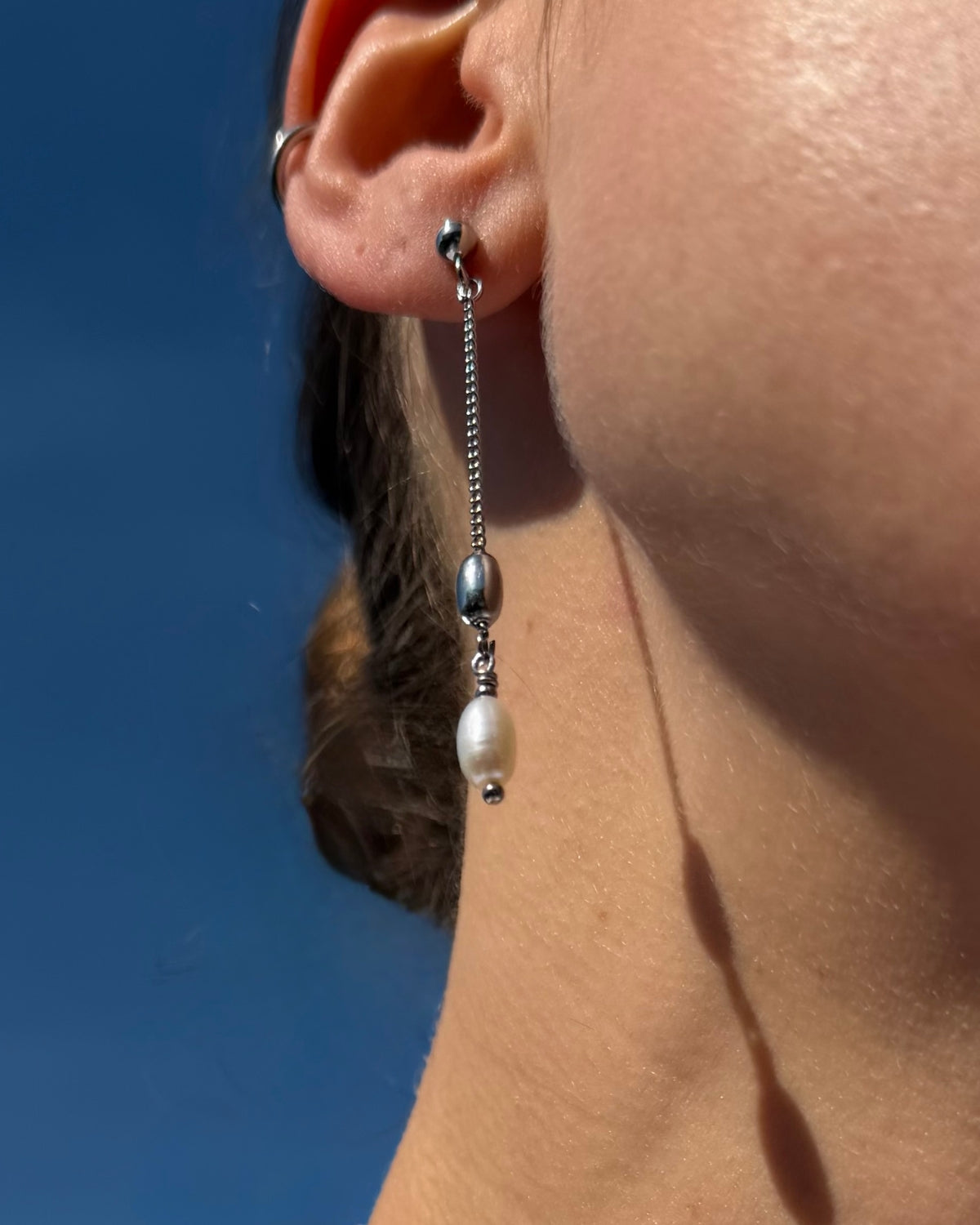 Cleo | Lange oorbellen met parels | Zilver stainless steel