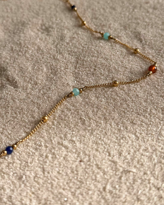 goud enkelbandje met stenen