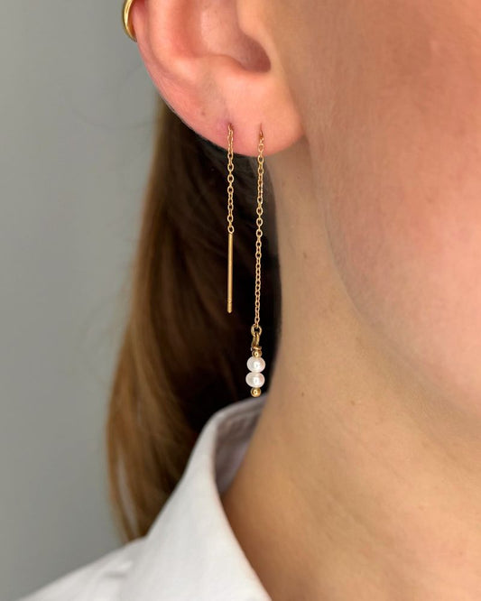 gouden doortrekoorbellen met parels