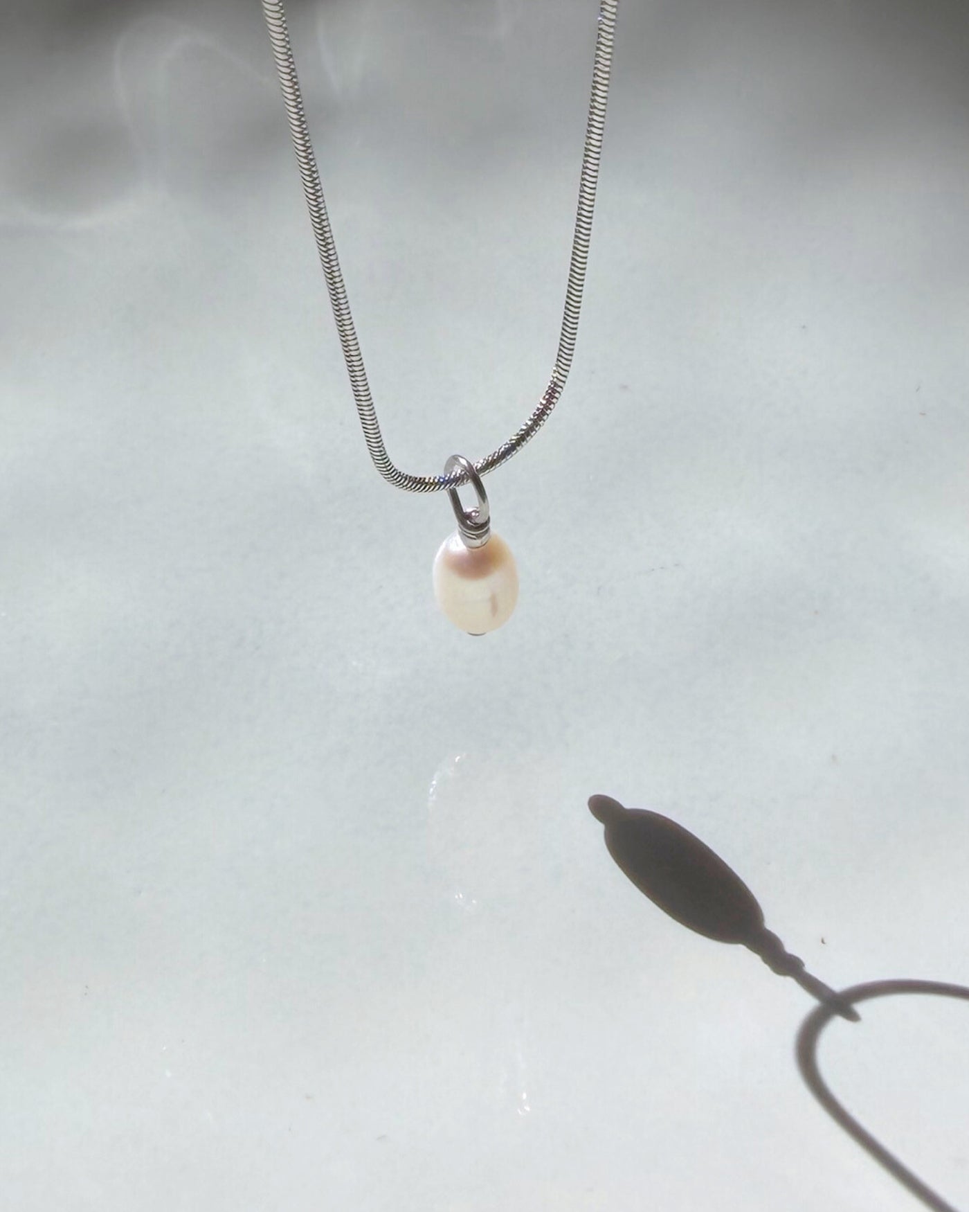 Gwyn | Zilveren ketting met parel hanger | Stainless steel