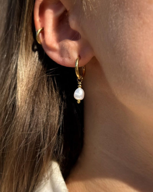 gouden oorbellen met barokparels