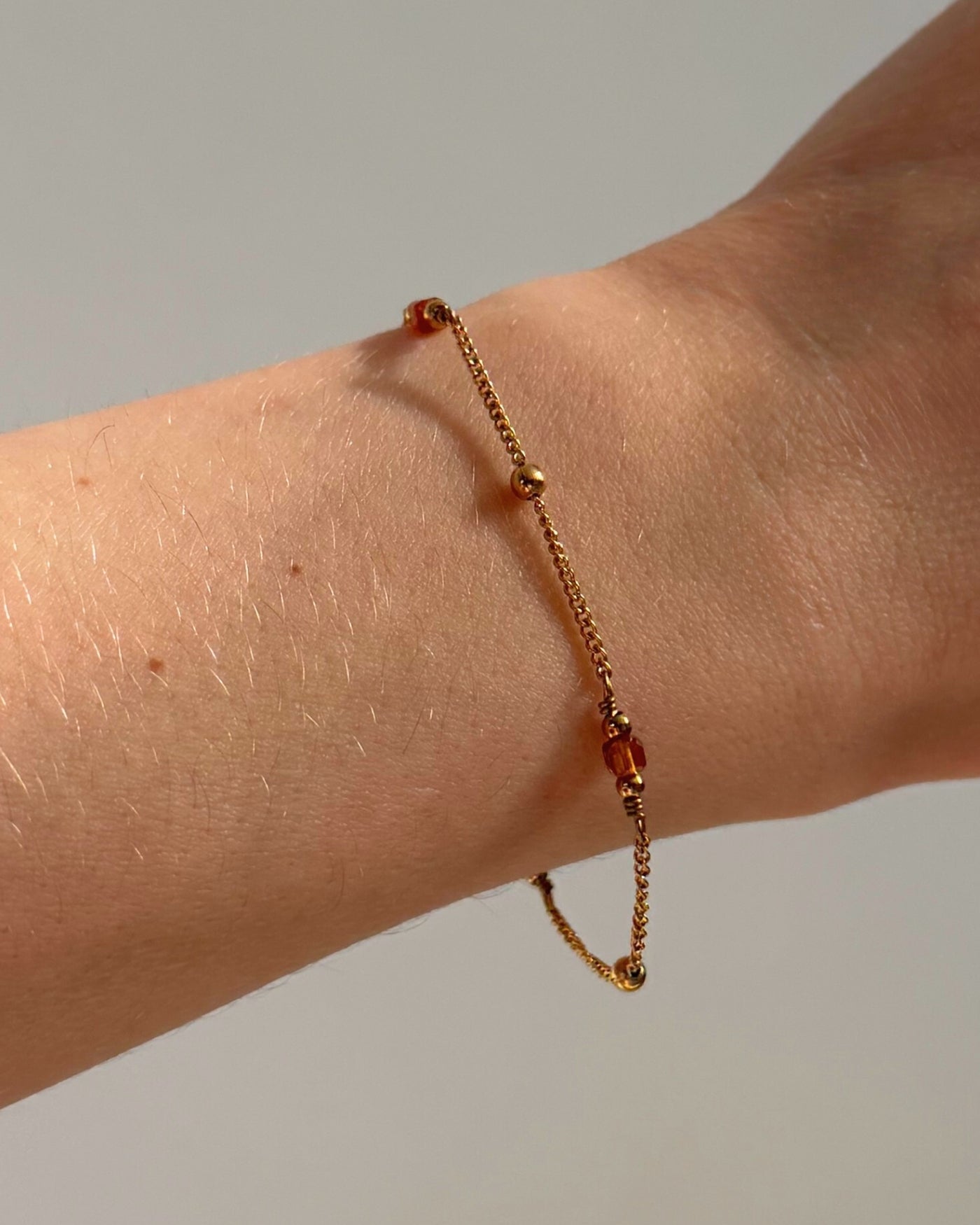 Sahara | Gouden armband met oranje Granaatsteen | Stainless steel