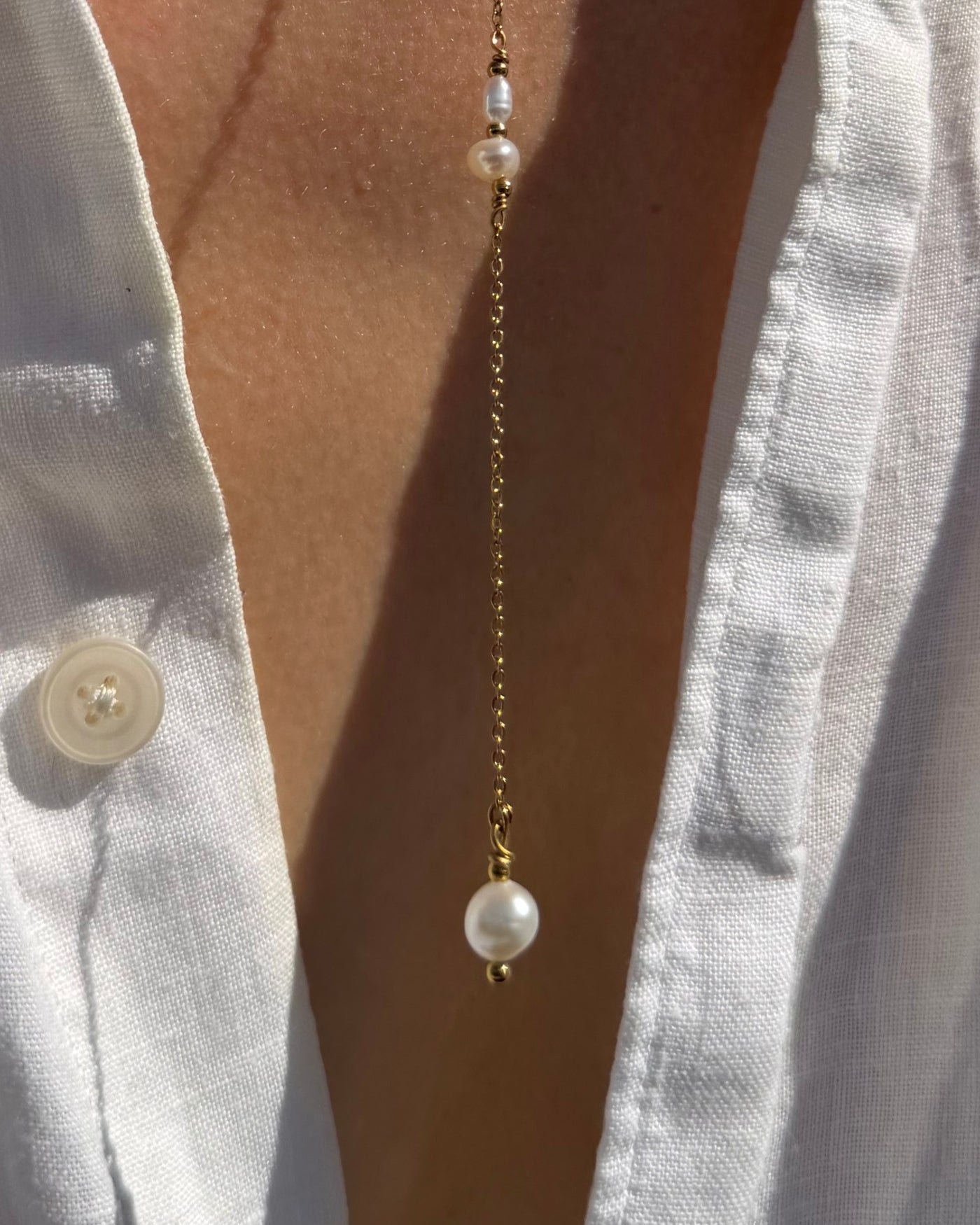 gouden lange ketting met parels