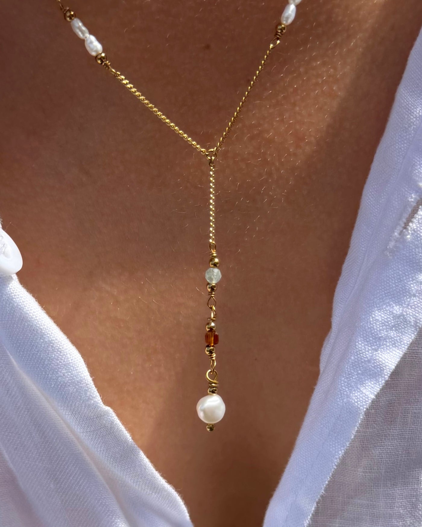 lange ketting met zoetwaterparels goud
