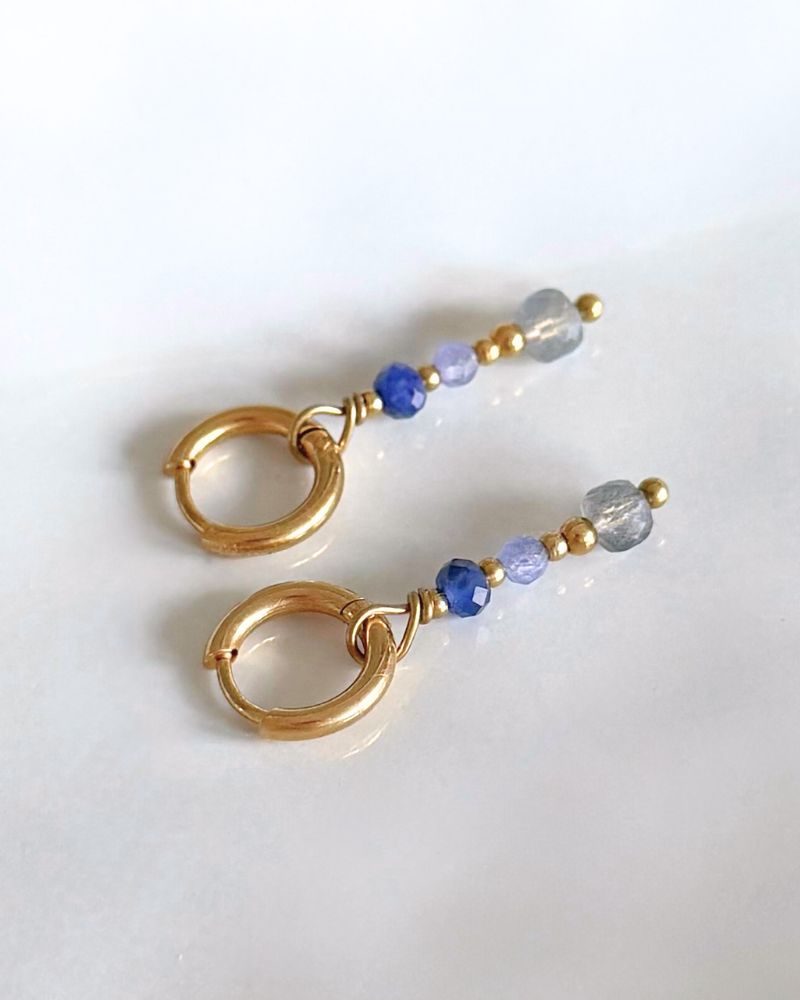 Nox | Oorbellen met grijze en blauwe stenen | Goud stainless steel