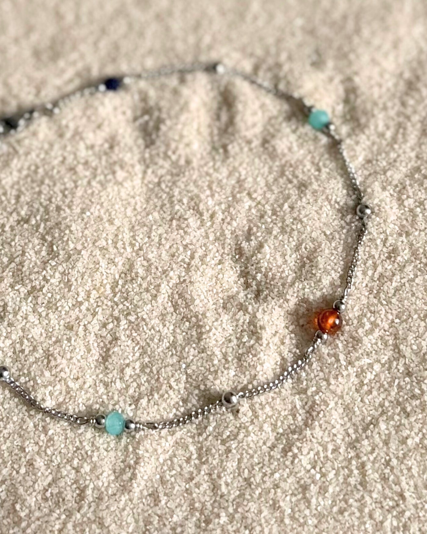 Enkelbandje met oranje en blauwe stenen | Zilver stainless steel
