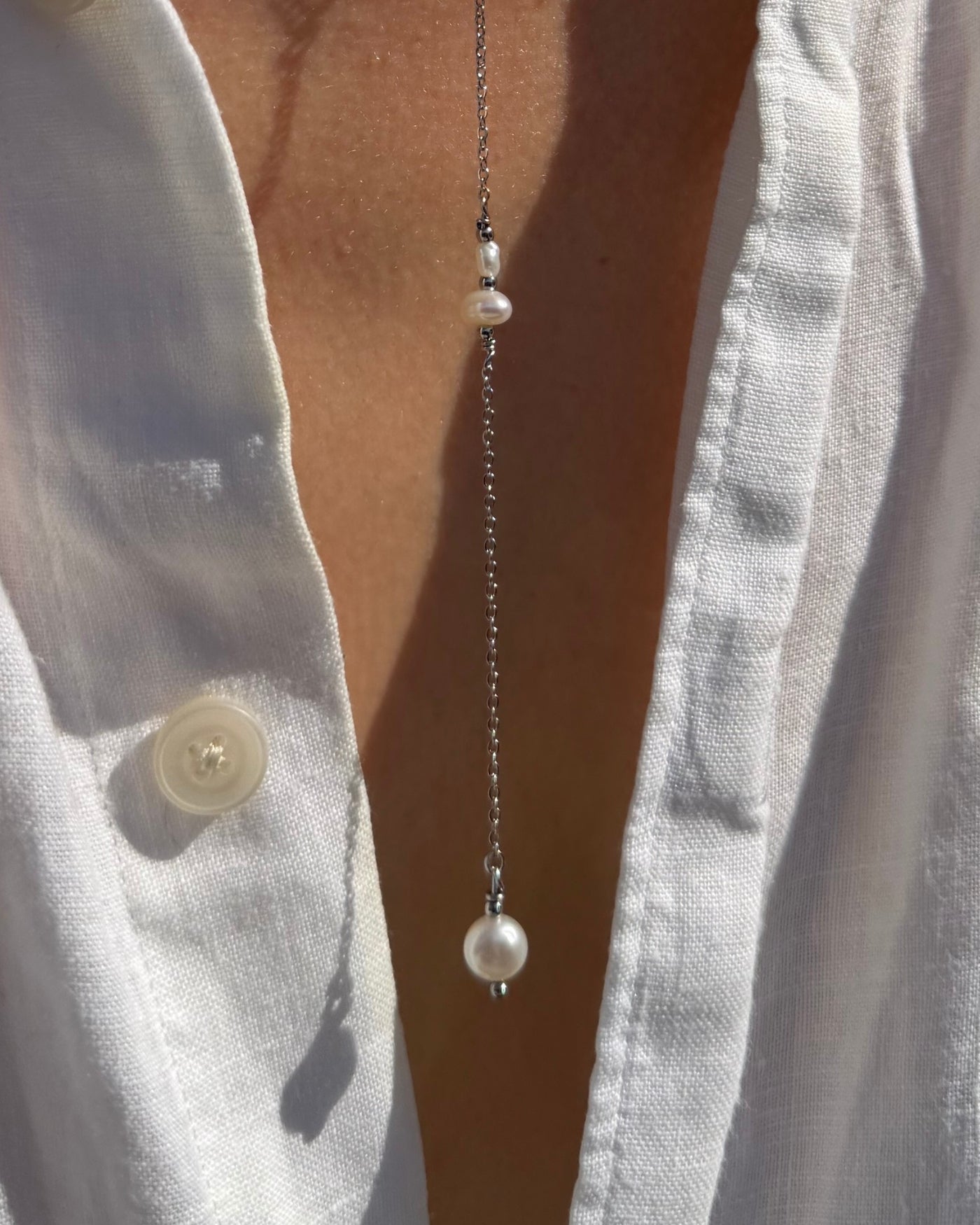 Nerea | Lange Y-ketting met zoetwaterparels | Zilver stainless steel
