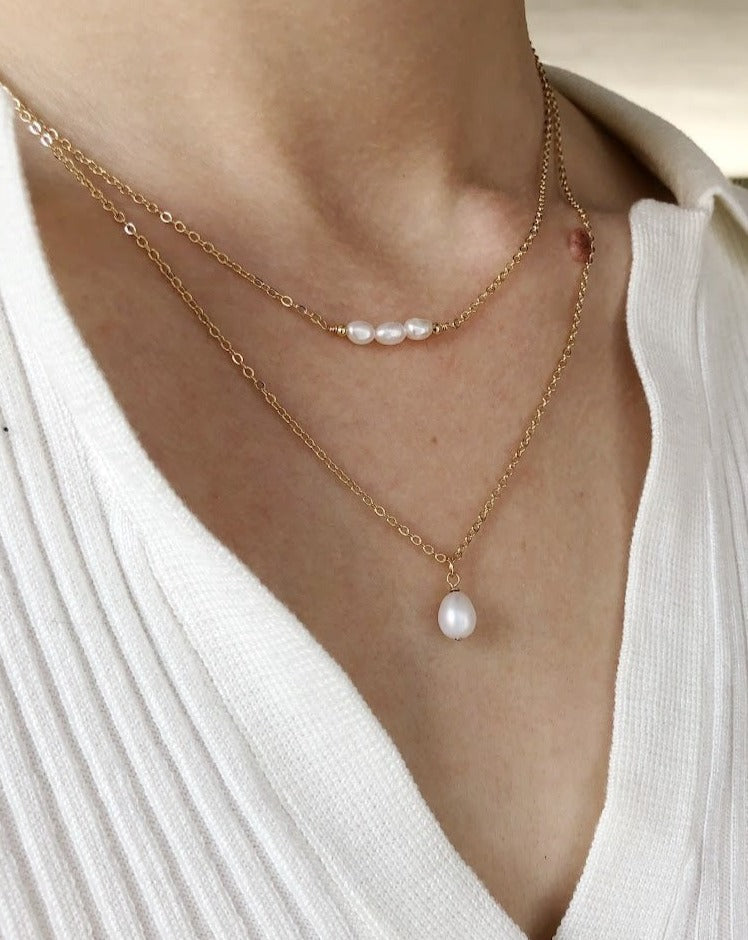 Minimalistische gouden ketting met zoetwater parels