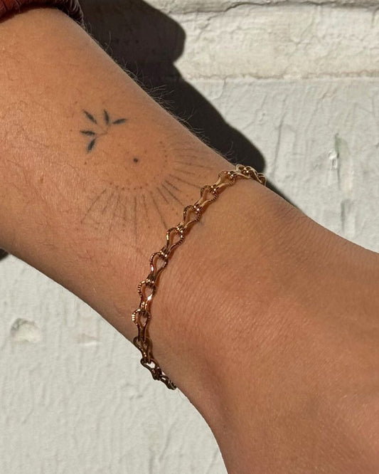 Gouden schakelarmband met parel Goud stainless steel