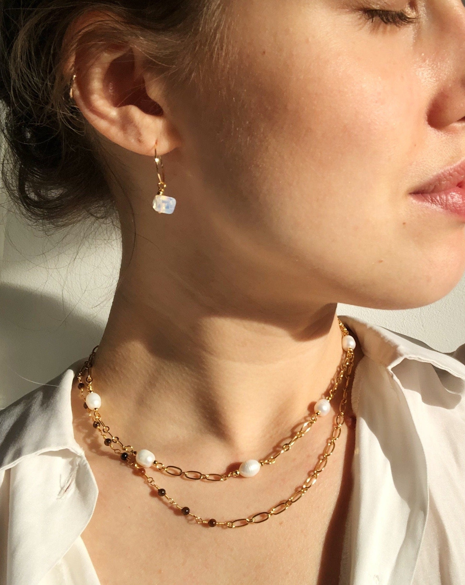 Souvenir officieel Verstrooien Gouden oorbellen met Opalite hangers | Goud stainless steel – Handmade  Amsterdam
